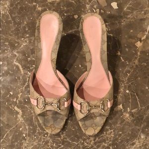 Gucci heels with silver buckle and pink accents